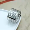 Venda quente transfronteiriça europeia e americana anel de guardanapo de metal restaurante ocidental mesa de jantar fivela de toalha hotel casamento anel de guardanapo de primavera