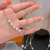 Diseño retráctil collar de perlas accesorios para mujer temperamento uso diario cadena para la clavícula nicho collar con colgante de alta gama