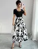 Vestido de Verano 2026 Nuevo Estilo Europeo y Americano con Estampado y Patchwork, Corte A para Mujer, Elegante y Adelgazante, Vestido Largo, Artículo Popular Transfronterizo