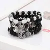 25 Pulseras Populares de Estilo Bohemio Étnico Europeo y Americano Colgante de Mariposa Ancla Elefante Pulsera Elástica Multicapa Venta al por Mayor
