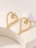 1 par de pendientes de moda europeos y americanos transfronterizos huecos con forma de corazón irregulares únicos para mujer