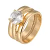 Moda exquisita joyería de pareja acero inoxidable chapado en oro anillo de pareja rayado titanio acero circón anillo de cara ancha venta al por mayor