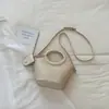 Bolso de hombro para mujer Shuai Mijia, bolso de hombro con patrón tejido simple, nuevo bolso cruzado tipo cubo de moda texturizado 2026