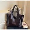 Bolsa feminina de alta qualidade e grande capacidade, nova coleção outono/inverno 2026, bolsa de ombro simples vintage, bolsa tote casual para o dia a dia, moderna