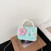 Nueva Versión Coreana Transfronteriza Bolso Infantil de Lazo Pequeño Estilo Chanel Camelia Bolso de Hombro Bolso de Mano con Perlas Versátil Bolso Cruzado