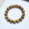 Demolición material viejo nanmu con borde dorado natural seiko ojo a ojo DIY león cantando cuentas de Buda cuerda hombres y mujeres placa pulsera Wen play