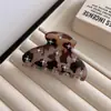 Pinza de tiburón para pelo semi-recogido para mujer, tamaño mediano, pinza para el pelo para la parte trasera de la cabeza, pinza de garra de metal simple y elegante, accesorio de pelo de alta gama