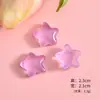 Nuevos accesorios de resina de estrella de mar fluorescente de dibujos animados al por mayor material diy hecho a mano cuerda para el cabello accesorios para el cabello funda para teléfono pegatinas para refrigerador
