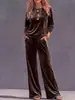 Conjunto casual suelto de top de manga larga de color liso con cuello redondo para mujer y pantalones casuales de pierna ancha, estación independiente transfronteriza europea y americana 2026
