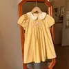 Roupas Infantis de Verão 2026 Vestido de Menina Bordado de Animal Smocked Gola de Boneca Mangas Curtas Bufantes Saia Infantil Xadrez