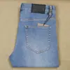 Calça Jeans Masculina Outono Média-Grossa Fibra de Poliéster Moda Slim Stretch Algodão Branco Lavado Azul Liso
