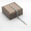 Pulseira cruzada europeia e americana TK mais vendida com pedra olho de gato banhada a ouro 18K, pulseira magnética feminina moderna e estilosa, atacado do fabricante