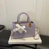 2026 Verano Nueva Moda Elegante Texturizado Simple Diseño de Nicho Versátil Bolso de Hombro Cruzado Pequeño Cuadrado