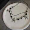 Collar de cadena de clavícula multicapa con cuentas redondas blancas y negras de estrella de cinco puntas de planeta punk personalizado, estilo hip hop, genial y atractivo para chicas.