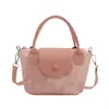 Bolsa de Dumpling de Comércio Exterior 2026 Novo Estilo Bolsa Feminina Tendência Moda Versátil Ombro Único Transversal Bolsa de Mão com Textura de Alta Qualidade