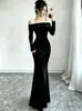 2026 Nuevo Otoño/Invierno Transfronterizo Vestido Largo Ajustado de Terciopelo Dorado sin Hombros de Manga Larga Elegante para Mujer