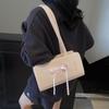 Bolsa de axila com textura de nicho bolsa feminina 2025 nova moda bolsa tote com laço coreano bolsa de ombro portátil para o dia a dia