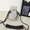Bolso pequeño cruzado de nailon estilo japonés color liso vertical para teléfono monedero casual minimalista bolsa para auriculares bolsa de tela cruzada ins