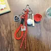 Llavero de Mascota Rojo Colgante para Bolsa de Año Nuevo Llavero de Pareja para Coche Día de Año Nuevo Pequeño Regalo Al por Mayor