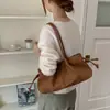 Bolsa Tote Curta de Camurça Feminina Grande Capacidade 2026 Outono/Inverno Nova Elegante Versátil Bolsa de Ombro Único para Trabalho e Deslocamento