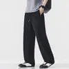 Pantalones Casuales Americanos para Hombre 2026 Primavera Verano Nuevos Sueltos Pierna Ancha Cordón Pantalones Largos Versátiles Pantalones Deportivos Venta al por Mayor