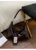 Bolsas de Mujer de Nicho 2026 Nuevo Estilo Casual Versátil Gran Capacidad Bolso de Hombro Tote Bolso de Mano para Viajes Cotidianos Bolso Cruzado Elegante