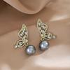 Pendientes de perlas de alta gama, sencillos, ligeros y de lujo, de estilo coreano con aguja plateada y diseño de nicho, con alas asimétricas y diamantes.