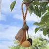 Colgante de Cadena para Llavero Carrillón de Viento Tejido a Mano con Cáscara de Fruta Natural Accesorio Pequeño Colgante para Bolso Hecho a Mano
