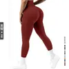 Novas calças de corrida fitness esportivas europeias e americanas transfronteiriças, calças de yoga de malha sem costura com levantamento de bumbum de pêssego, cintura V canelada de alta elasticidade