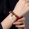 Pulsera de cuentas redondas de madera de incienso de Kalimantan Colgante de raíz de loto tallada Xiuyu Pulsera Wen play Joyería de cuentas de Buda al por mayor