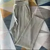 Calça Jogger Masculina Verão Seda Gelada Tendência Elástica Solta Perna Reta Calça Casual de Algodão Moda Masculina Simples Cor Sólida Versátil