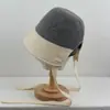 Sombrero de pescador retro coreano de otoño e invierno con bloques de color para mujer con circunferencia de cabeza grande, abertura trasera para hacer que la cara parezca más pequeña, sombrero de cubo liso y cálido