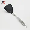 Venta al por mayor de fábrica Sartén antiadherente resistente a altas temperaturas Mango especial de acero inoxidable Espátula Juego de utensilios de cocina de silicona Pala para cocinar en la cocina