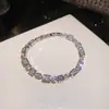 Pulsera de flor redonda con cierre de circonita, lujo ligero, alta gama, pulsera exquisita con un diseño elegante, versátil y a la moda, venta al por mayor