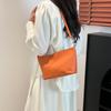 Moda Transfronteiriça Casual Versátil Bolsa de Ombro 2025 Nova Bolsa Balde Transversal Texturizada para Deslocamento Comércio Exterior