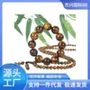 Nuevo brazalete de seda dorada sauce marino cuentas de coral negro sauce de sangre para hombres y mujeres brazalete de pareja juego de texto fábrica venta directa al por mayor
