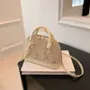 Bolsa de Mão Transversal de Ombro Único Bordada em Renda Tecida Moda Primavera 2026 Retrô de Alto Padrão Versátil Bolsa Concha