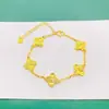 Pulsera Popular de Cobre Chapado en Oro Escama de Dragón Flor de Cuatro Hojas CNC para Mujer, Pulsera Finamente Tallada Flor de Cuatro Hojas Hielo Triturado Venta al por Mayor
