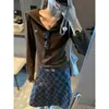 Además, la nueva camiseta de manga larga ajustada con cuello azul marino bordado de corazón estilo coreano para otoño MQ1618