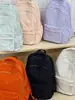 2026 Nova Mochila de Ombro Duplo em Tecido Oxford Feminina Grande Capacidade Leve Versátil Mochila Escolar para Estudante Mochila para Viagem ao Ar Livre para Computador