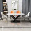 Mesa de comedor rectangular de placa de roca y combinación de sillas mesa de comedor para hogar apartamento pequeño mesa de celebridad de internet de estilo italiano simple moderno de lujo ligero