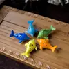 Suministrado directamente por el fabricante, ocarina de 6 agujeros con forma de delfín, flauta de cerámica de dibujos animados creativos, instrumento musical de educación temprana para niños