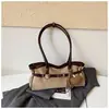 Bolso retro de gran capacidad para mujer ShuaiMijia 2026 otoño nuevo diseño de moda bandolera y bolso de mano para mujer