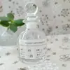 50ml botella de vidrio vacía regalo a mano estilo ins de moda 100g botella de miel botella de regalo de retorno de miel tapón de bola de vidrio para boda