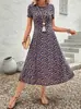 2026 Amazon Aliexpress Nuevo Vestido Floral Estilo Europeo y Americano para Mujer de Manga Corta Elegante Francés de Longitud Media Estampado