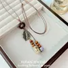 Nuevo Anillo de Hoja Estilo Étnico Chino Collar con Borla Exquisito Lujo Ligero Temperamento Bohemio Collar Personalizado