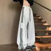 Colección de otoño: Pantalones casuales rectos atléticos para hombre, estilo americano, de corte holgado y pierna ancha, con colores contrastantes y rayas retro.