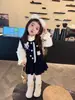 Conjunto de inverno espesso para meninas 2026 novo estilo infantil desenho animado colete acolchoado e saia conjunto de três peças roupas de inverno para bebês meninas
