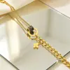 Collar de acero de titanio y oro rosa de doble cara con trébol de cuatro hojas para estudiantes femeninas, estilo coreano con borlas sencillas de red roja.