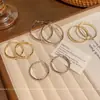 Aros Retorcidos Lisos para Mujer con Rostros Cuadrados o Redondos, Estilo Único y Exagerado, Sensación de Alta Gama, Nuevos Pendientes Populares 2026